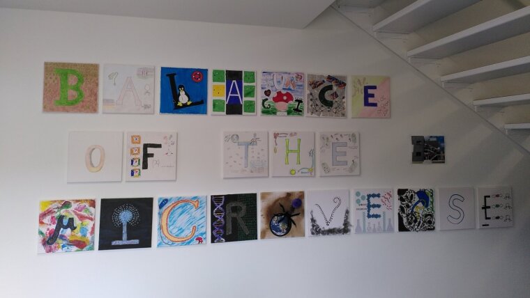 22 canvases represent 22 projects or work areas within both working groups on Rosalind Franklin street. Each employee in the building designed one of the canvases with his or her focus.